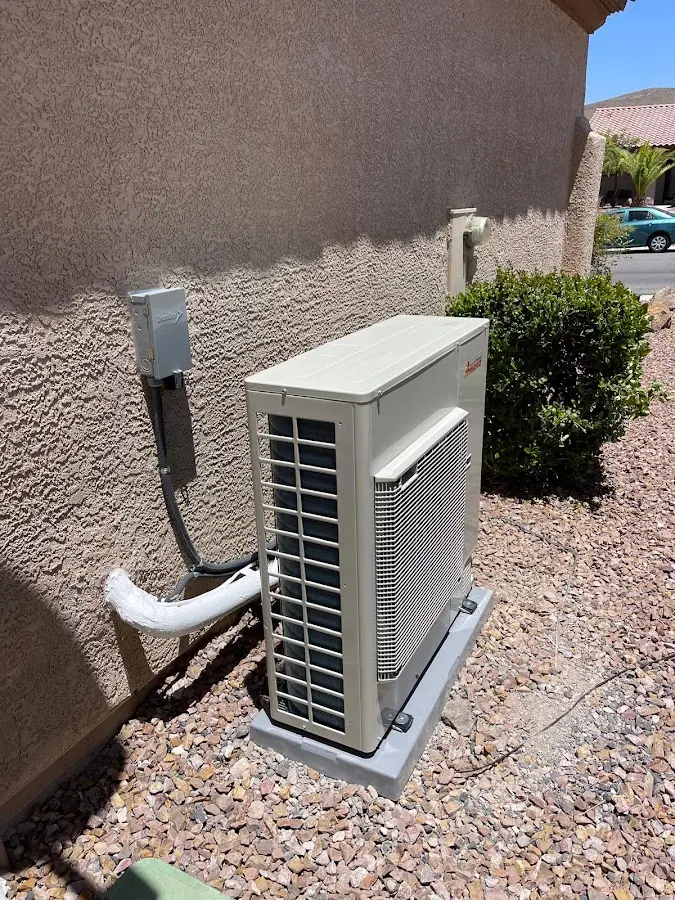 Residential air conditioning condenser unit in Gladeview